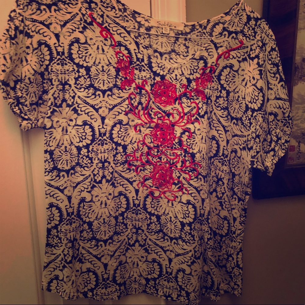 Cute lightweight navy top. Red embroidery.